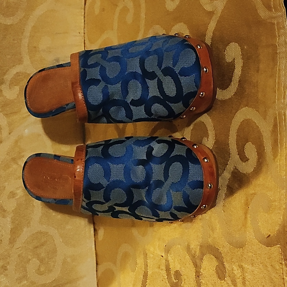 Women size 5 1/2 Coach high heel clogs.